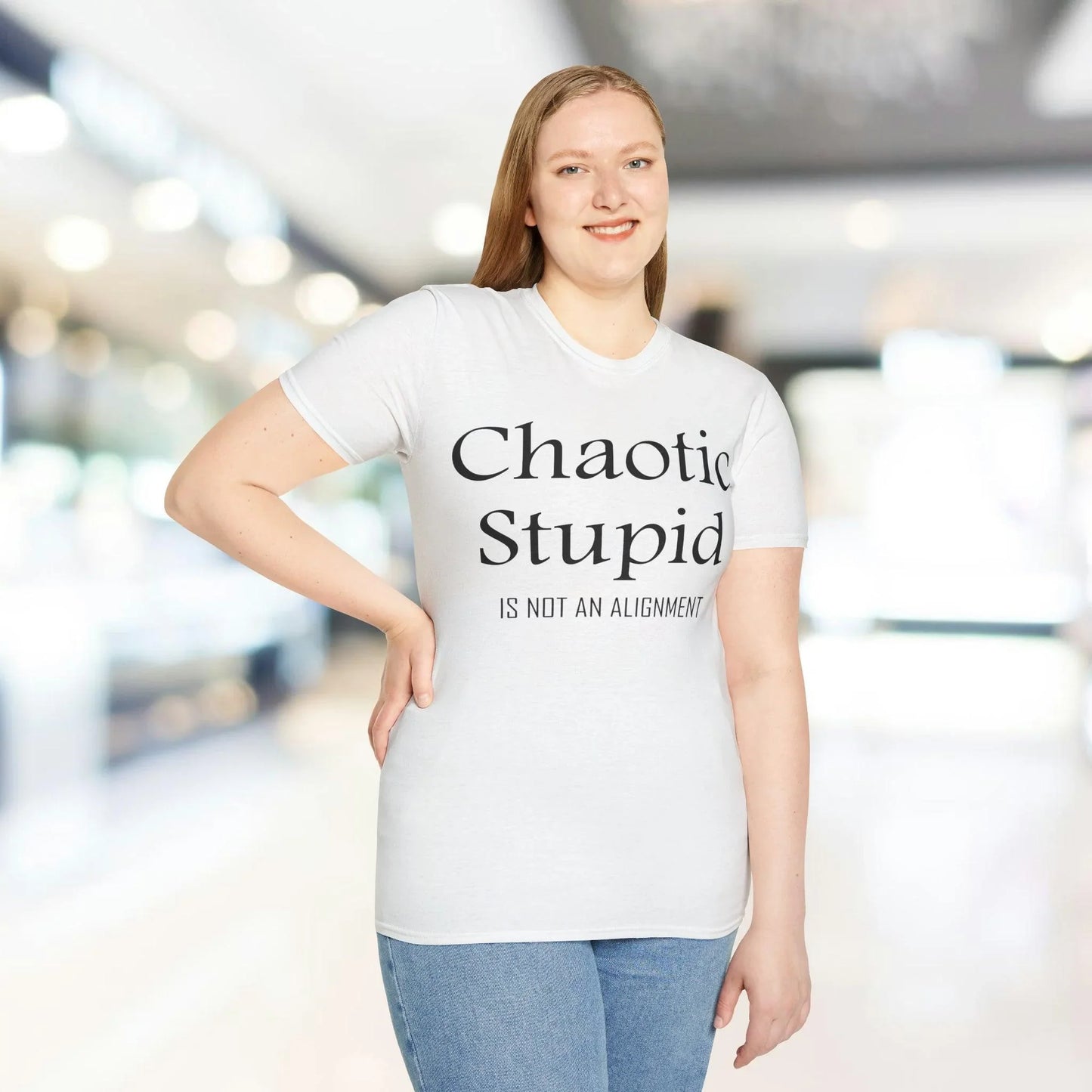 Close-up of black unisex softstyle T-shirt fabric showing smooth texture and subtle stitching detail at the neckline seam.