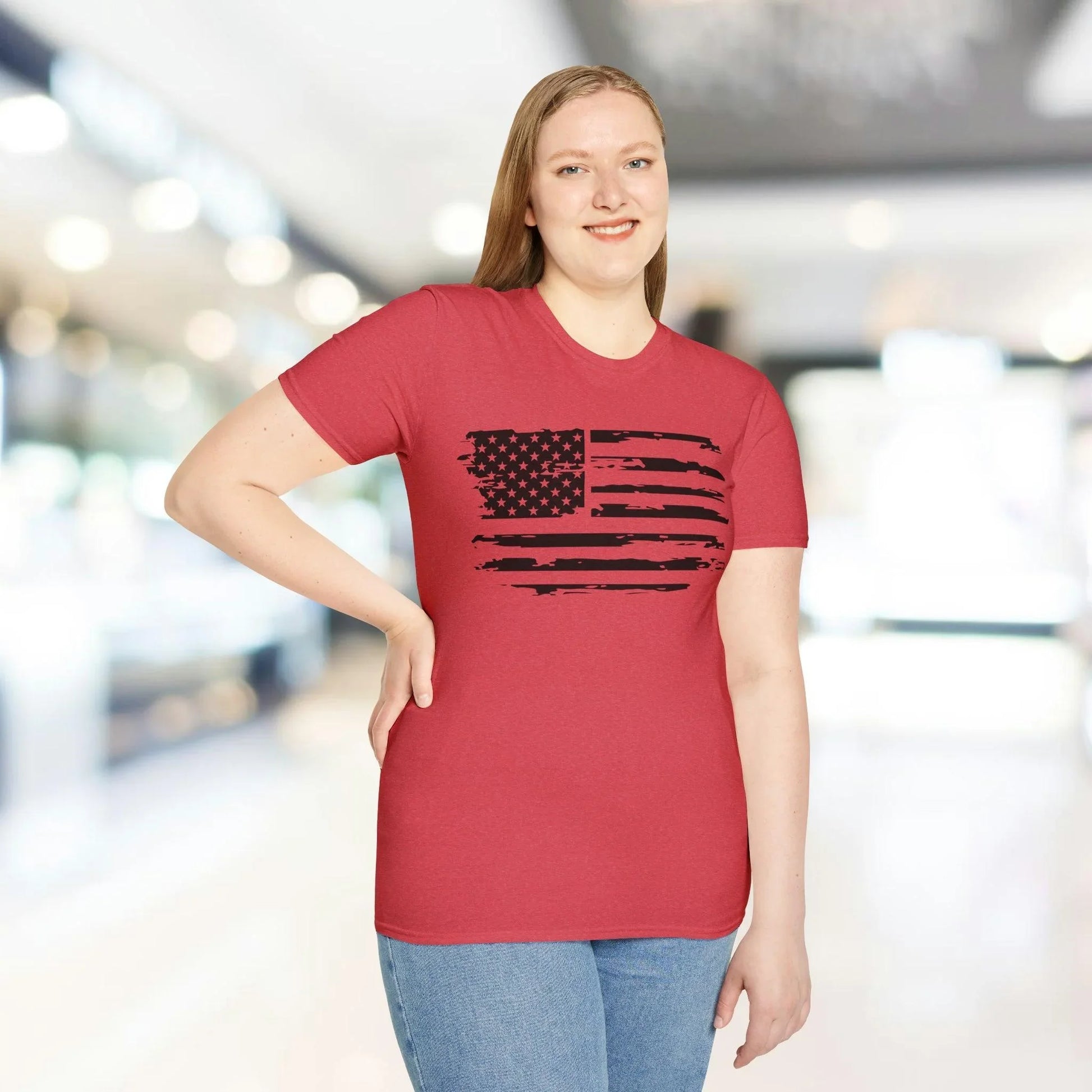Close-up of distressed American flag black-and-white print on front chest area, highlighting faded fabric texture and