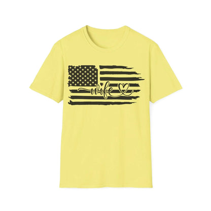 Close-up of black and white distressed American flag graphic on soft cotton fabric, highlighting faded worn texture and