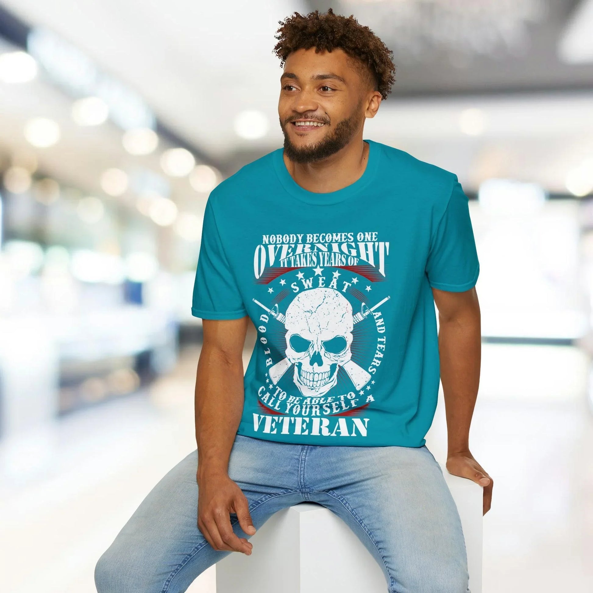 Close-up of the unisex relaxed fit T-shirt’s neckline and soft fabric texture in vibrant red color, highlighting stitching