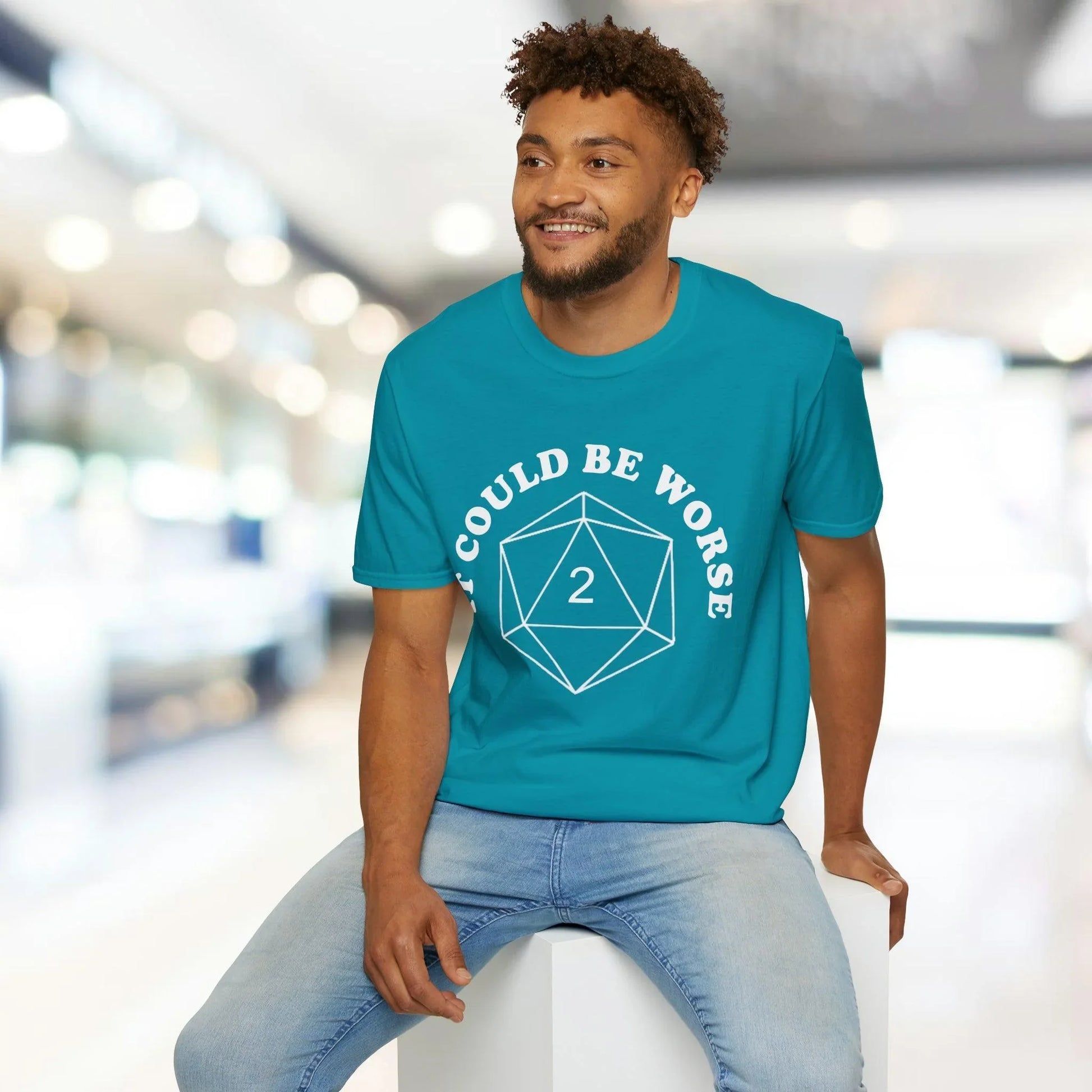 Close-up of the white Unisex Softstyle T-Shirt’s collar and neckline stitching from an overhead angle, highlighting smooth