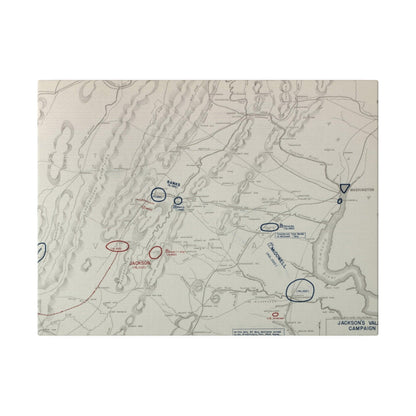 Close-up of textured canvas surface highlighting subtle color variations and fine weave detail from a top-down perspective.