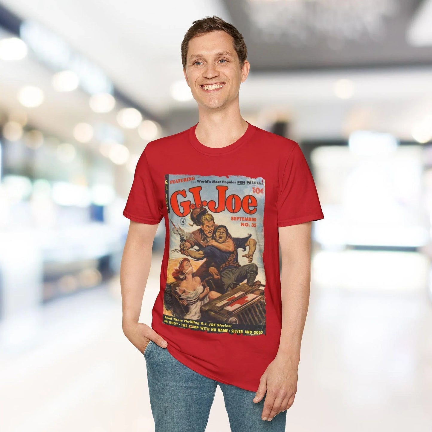 Close-up of the G.I. Joe No.35 T-shirt fabric showing soft cotton blend texture and vibrant red color from a slightly angled