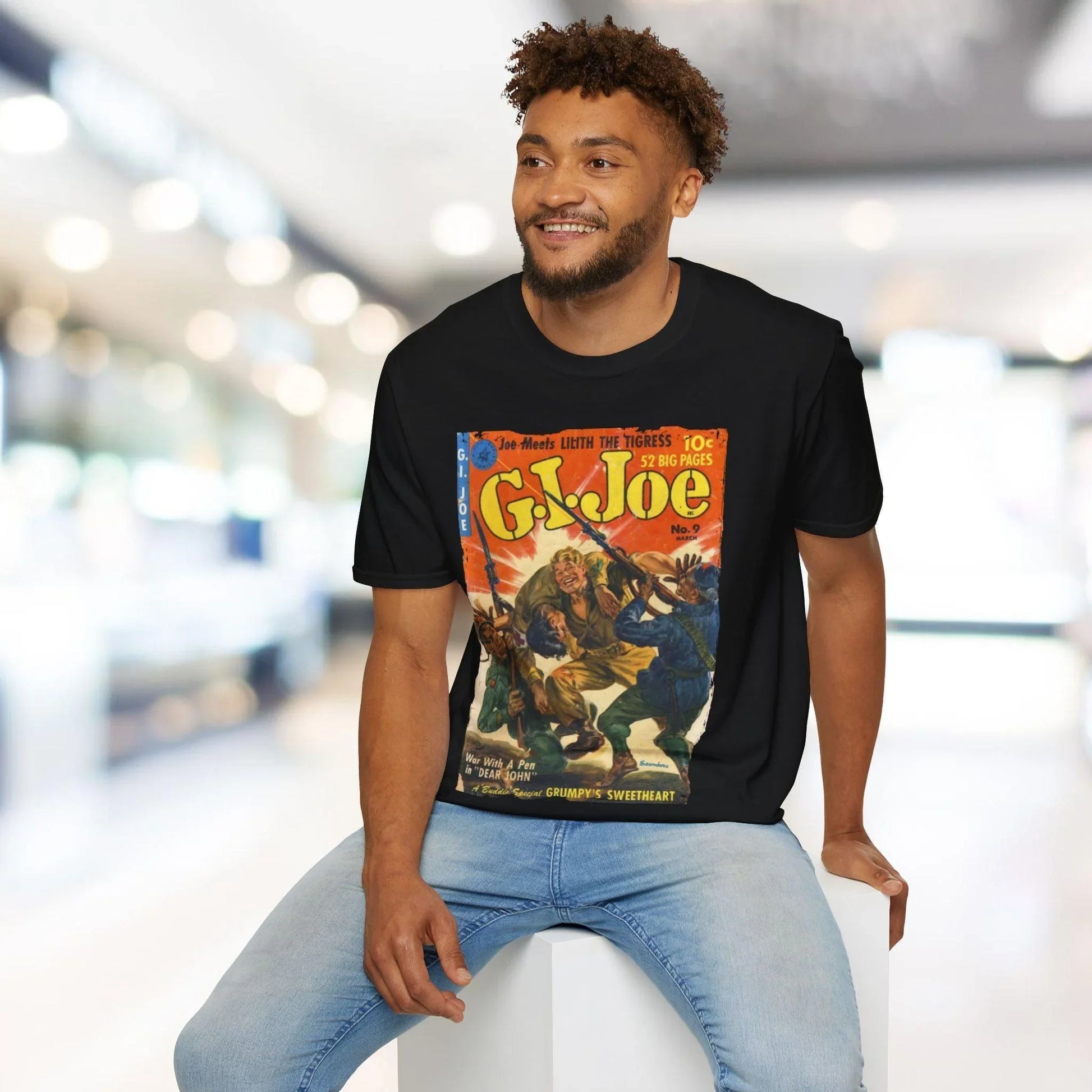 Close-up of the unisex softstyle T-shirt's vibrant blue fabric and subtle seam details around the neckline from a diagonal