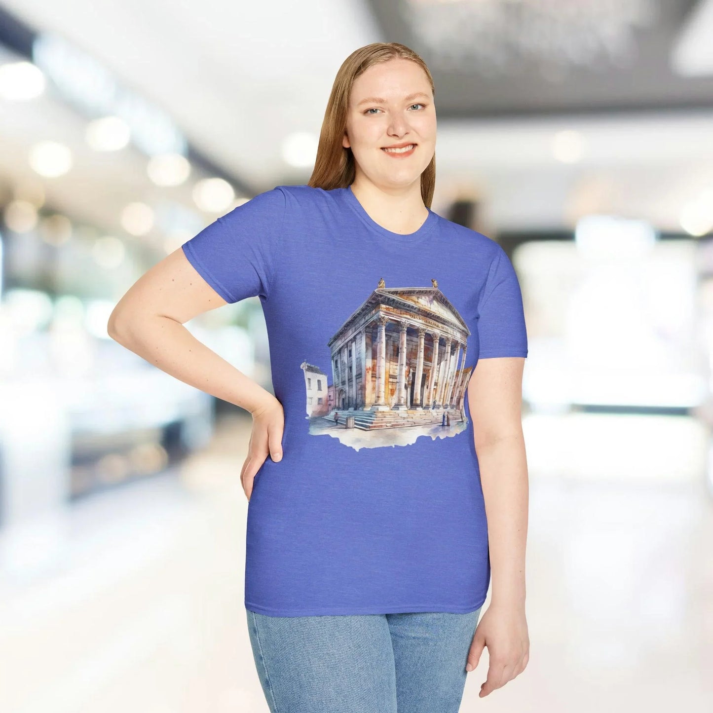 Close-up of the unisex softstyle fabric label sewn onto the hem of the relaxed fit slate gray T-shirt with ribbed neckline