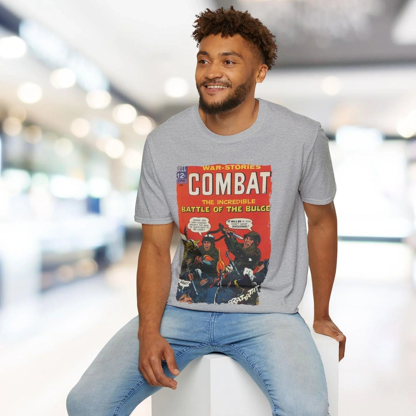 Close-up of the Combat June 1966 T-shirt fabric showing soft cotton jersey texture and rich olive green color detail.