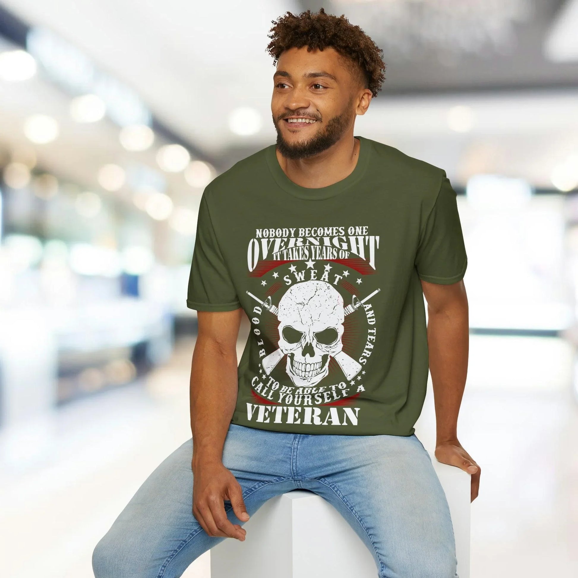 Close-up of the unisex softstyle T-shirt's fabric texture highlighting the relaxed fit and vibrant charcoal gray color from