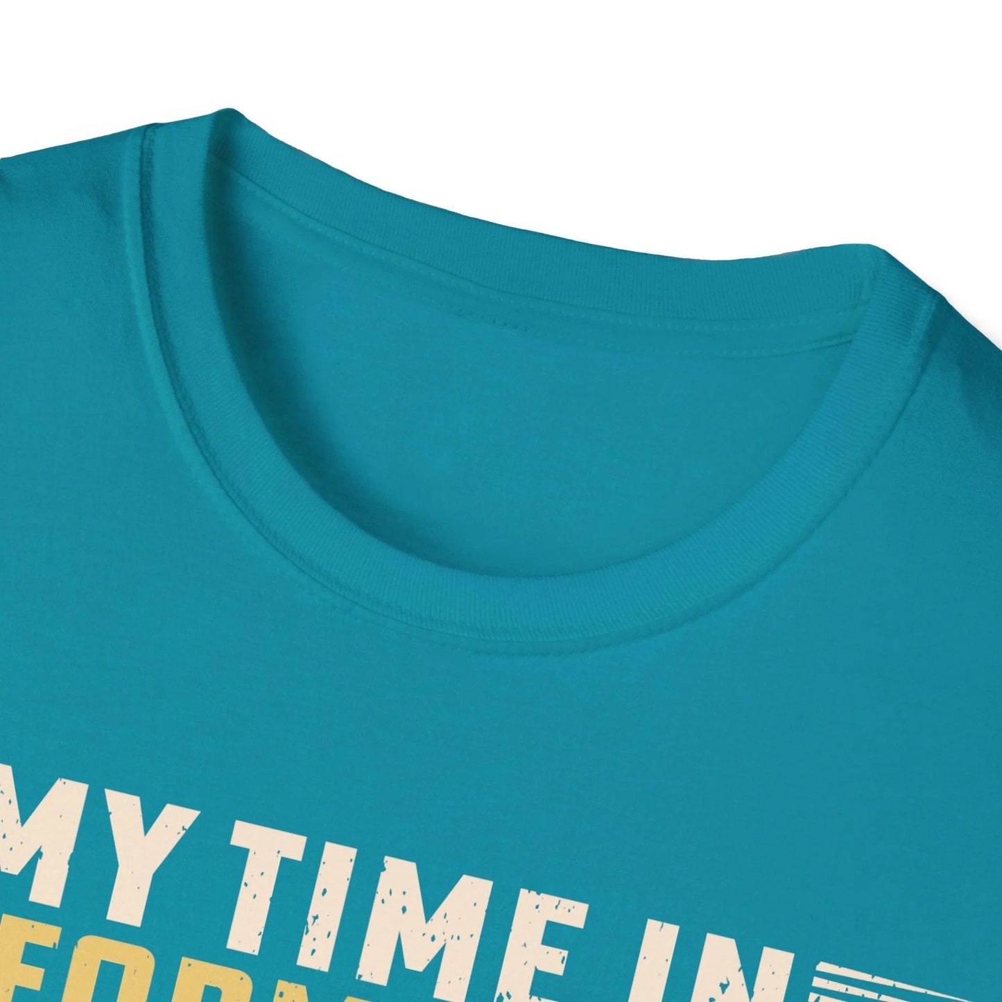 Close-up of the unisex softstyle T-shirt’s navy fabric texture and stitched collar detail from a slightly elevated front