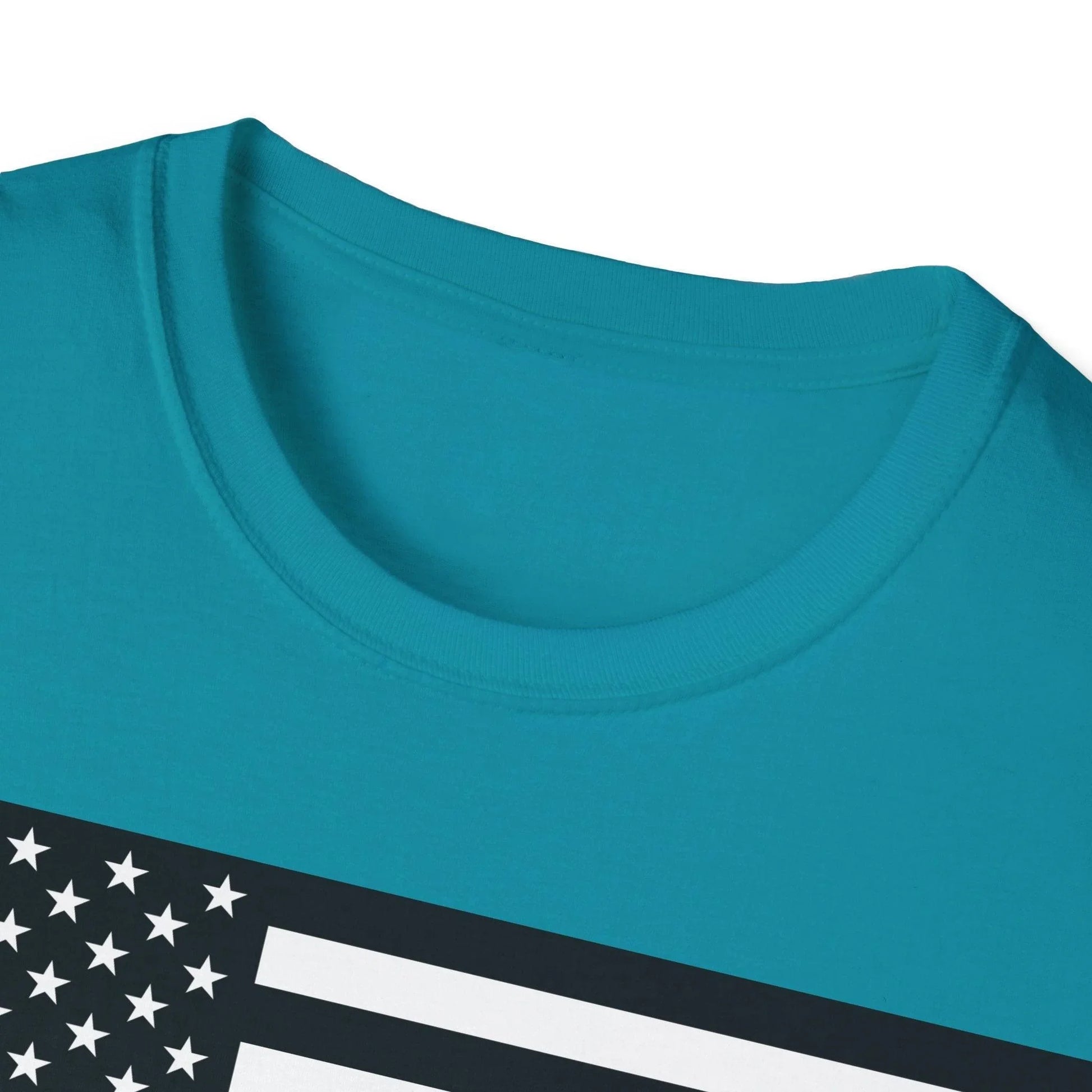 Close-up of the black and white heartbeat American flag graphic centered on the chest area of the unisex softstyle T-shirt’s