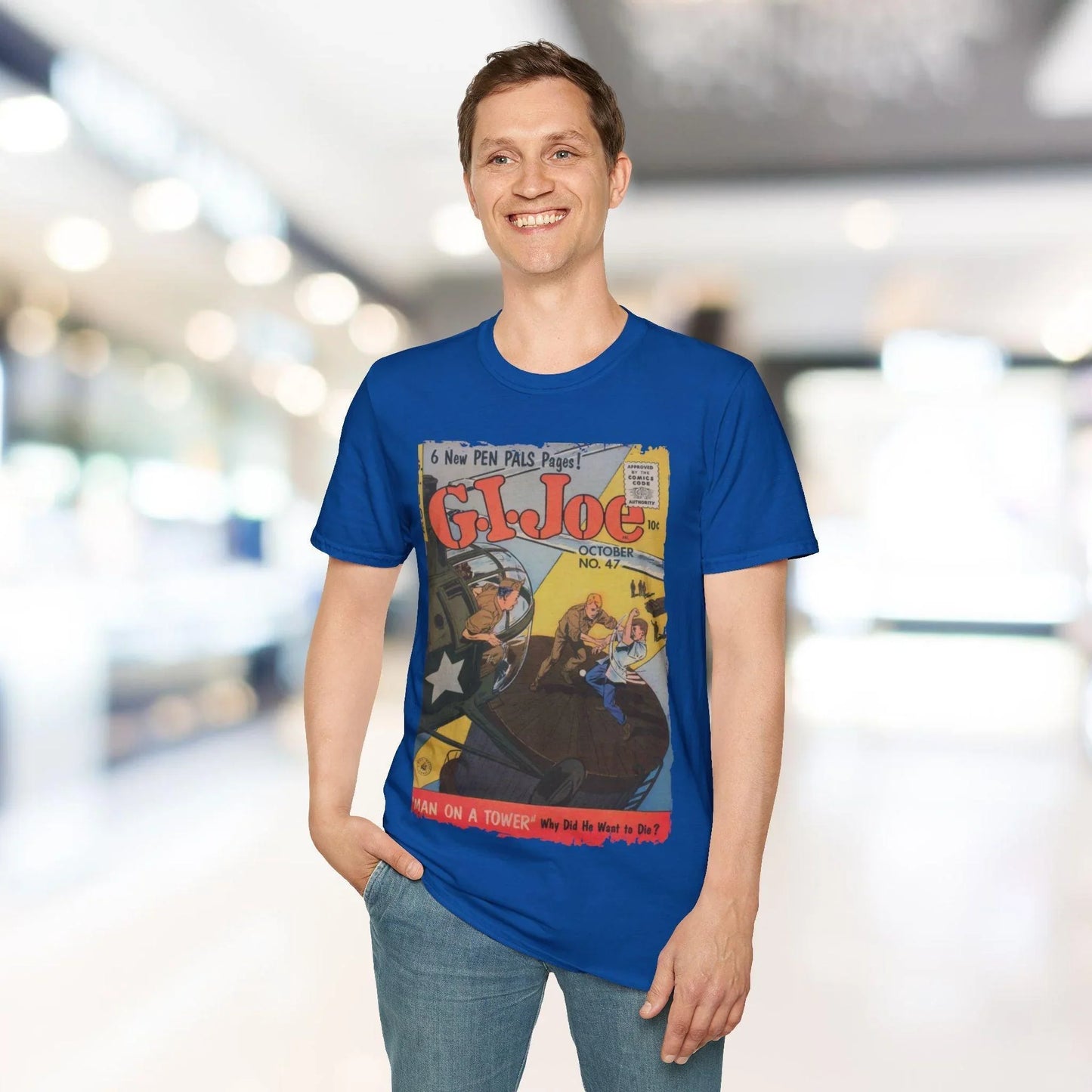 Close-up of the G.I. Joe No.47 unisex softstyle T-shirt's navy fabric displaying subtle heather texture and reinforced