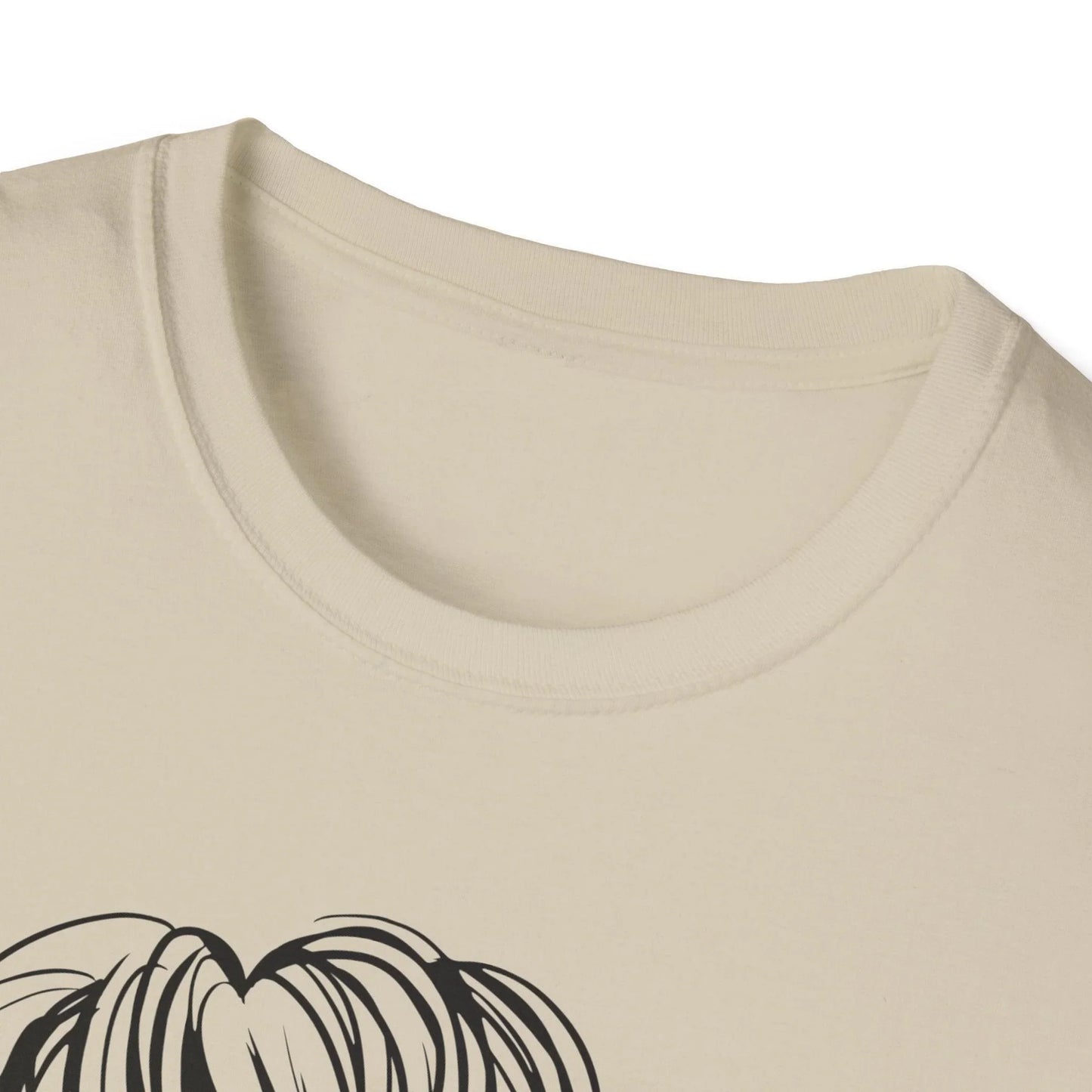 Close-up of the relaxed-fit unisex T-shirt's seam detail showcasing soft cotton fabric and subtle stitching on charcoal gray