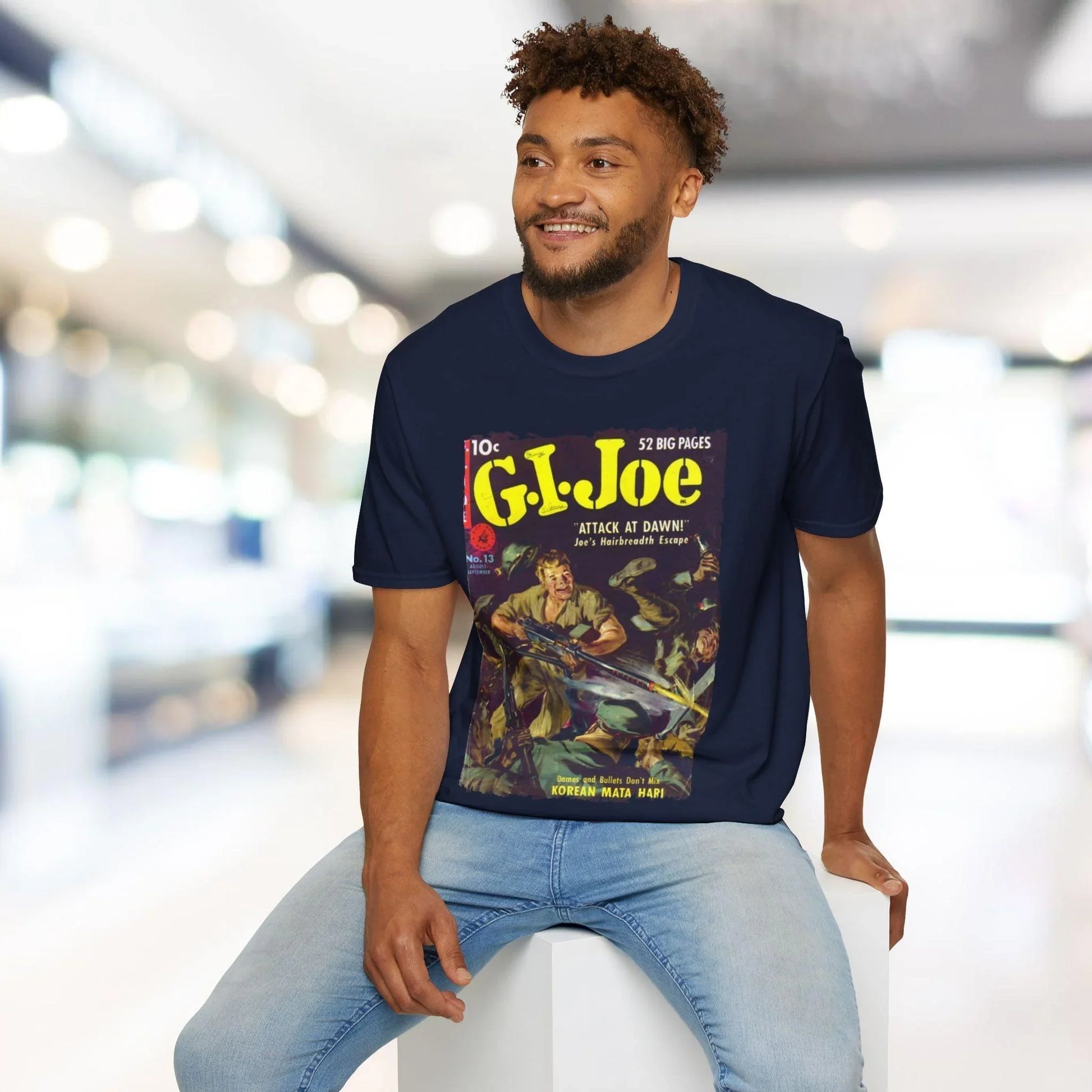 Close-up of the G.I. Joe No.13 softstyle cotton fabric showing subtle heather texture and relaxed fit neckline detail.