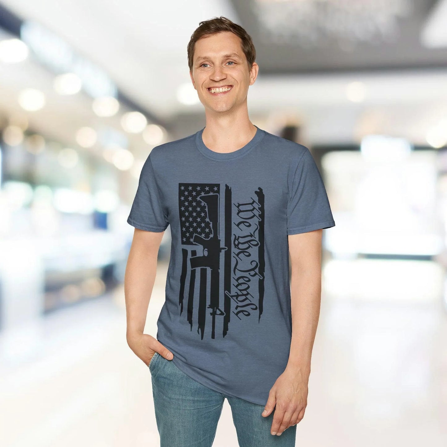 Close-up of distressed black-and-white American flag design on the soft cotton fabric at the sleeve edge of the unisex