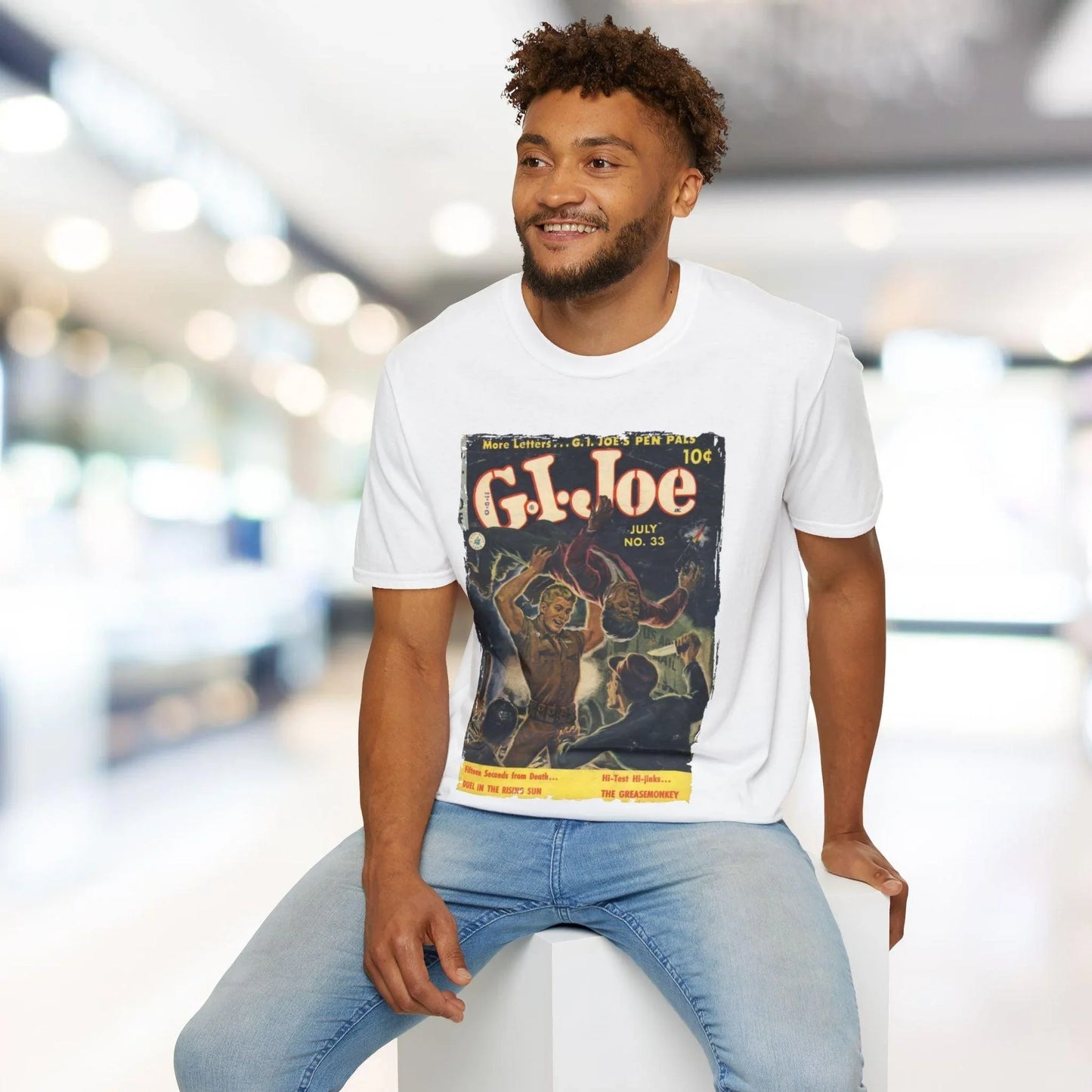 Close-up of the G.I. Joe No.33 unisex softstyle T-shirt’s fabric texture and vivid army green color from an overhead angle