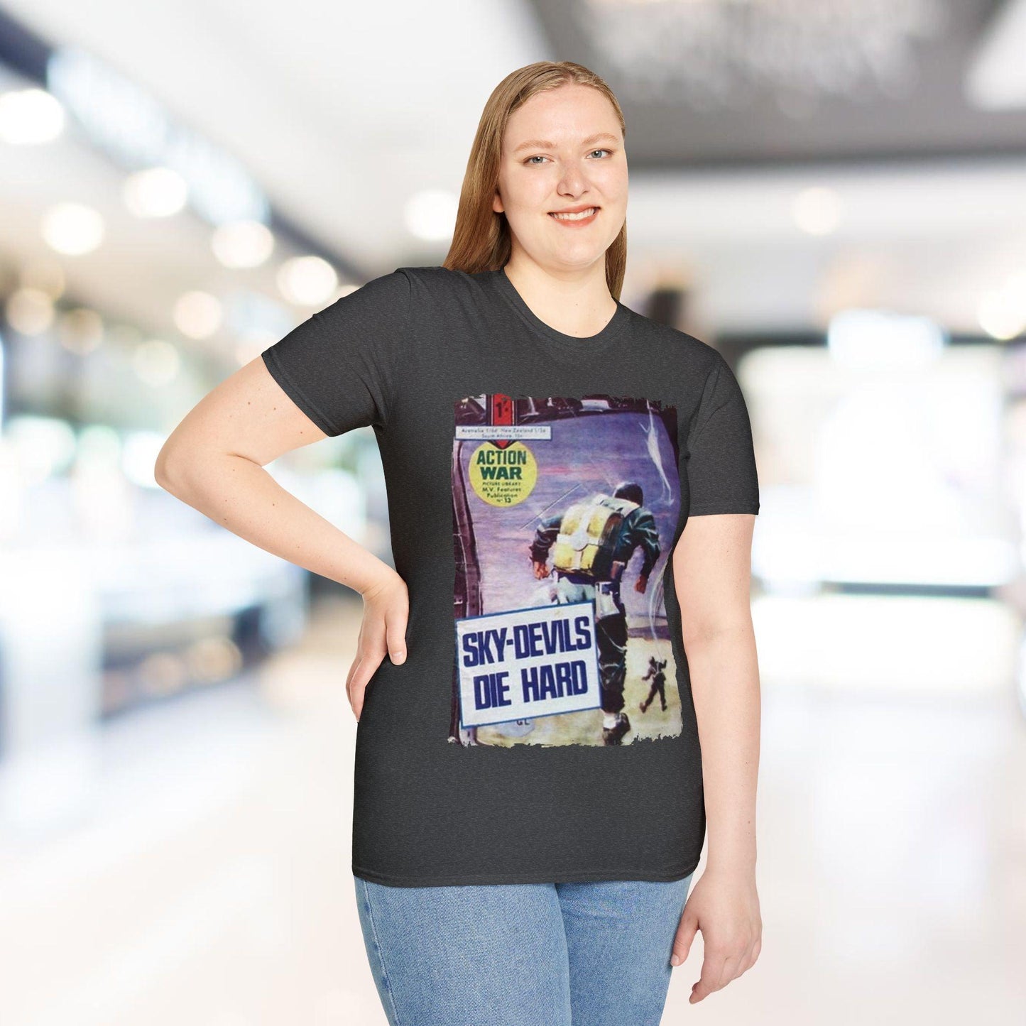 Close-up of the unisex softstyle T-shirt’s fabric texture highlighting the smooth, relaxed fit in vibrant crimson color and