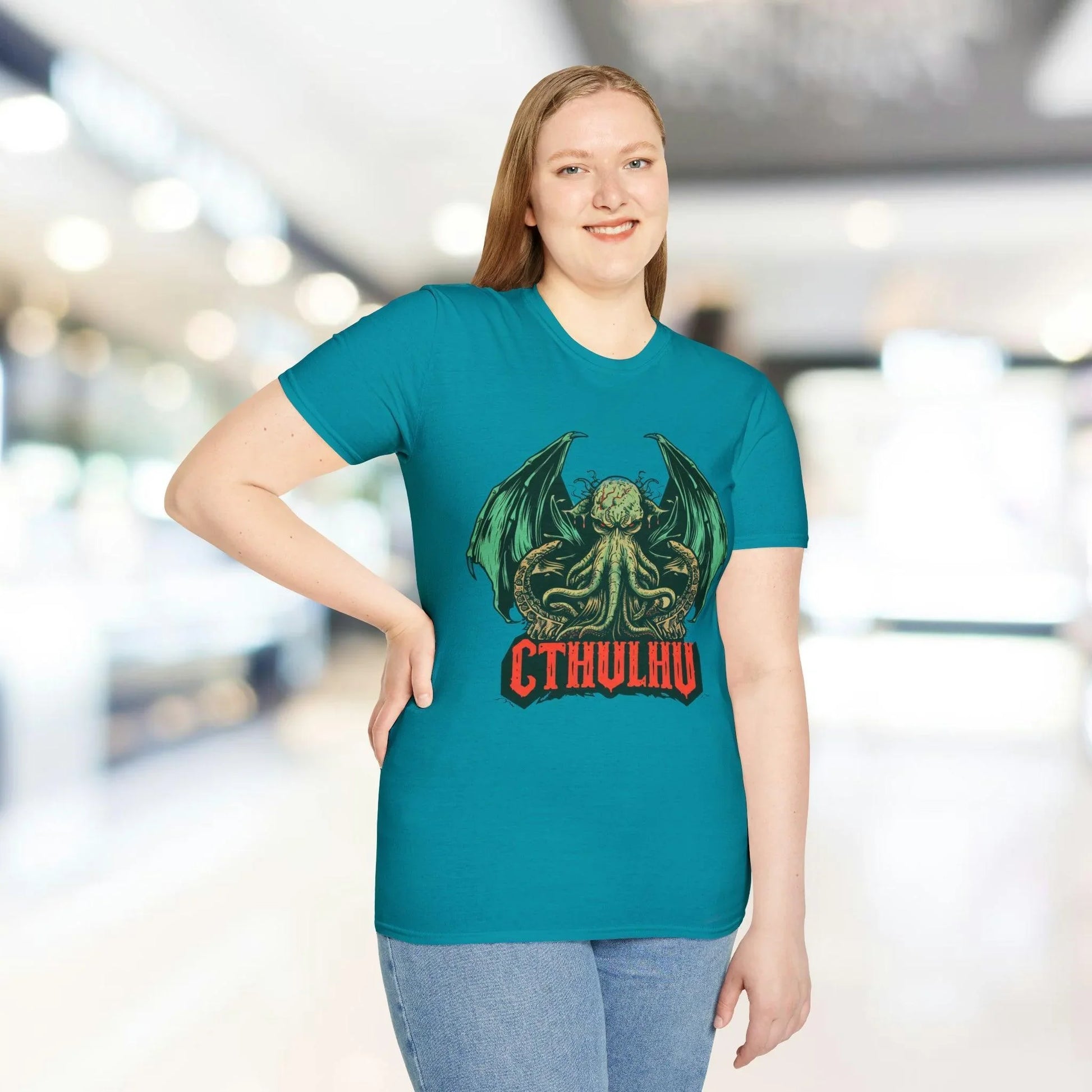 Close-up of the Cthulhu graphic on the chest, showcasing detailed dark teal ink and smooth softstyle fabric texture of the