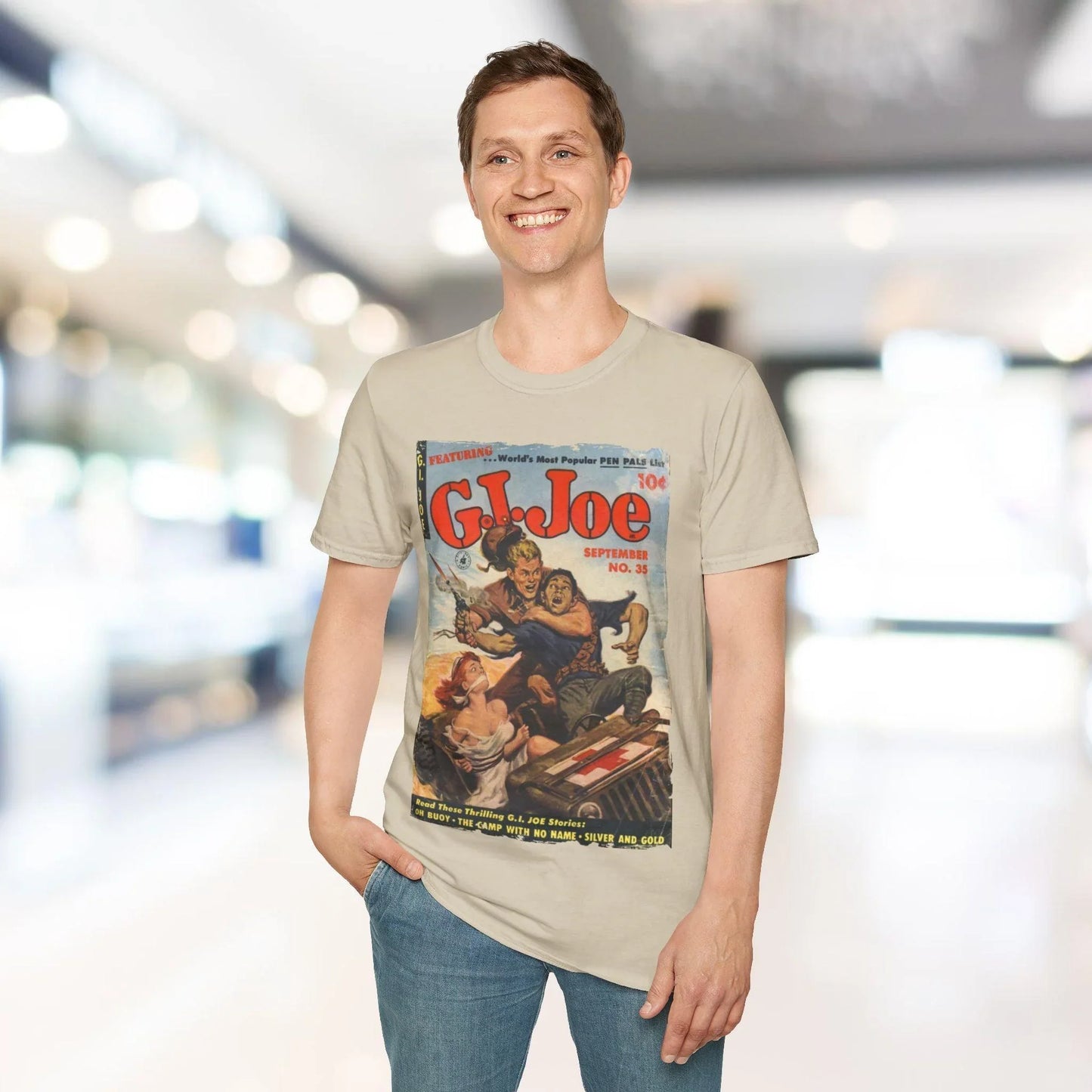 Close-up of the unisex softstyle T-shirt fabric showing the smooth, relaxed fit and vibrant navy color with subtle stitching