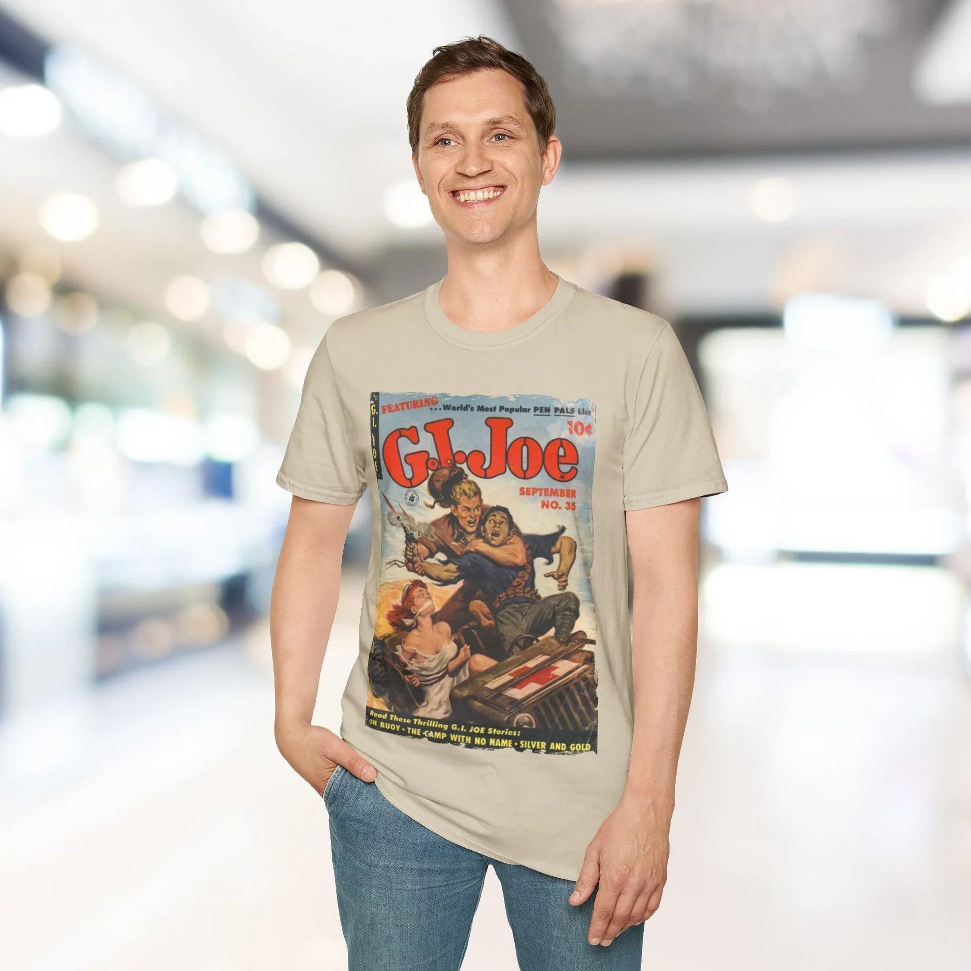 Close-up of the unisex softstyle T-shirt fabric showing the smooth, relaxed fit and vibrant navy color with subtle stitching