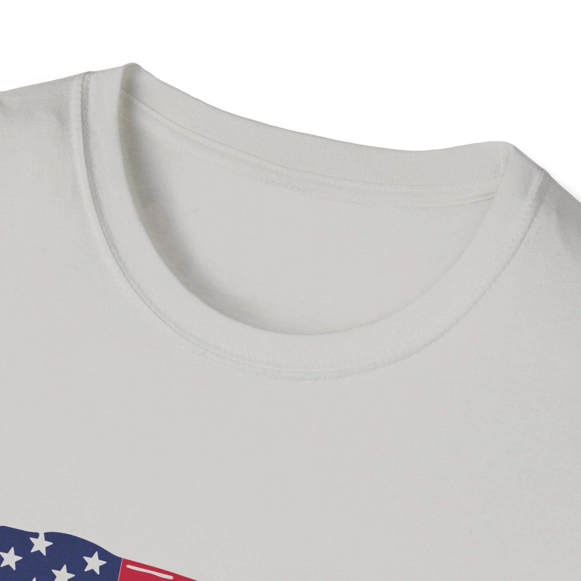 Close-up of the distressed American flag heartbeat graphic centered on the chest of the cream-colored softstyle tee with a