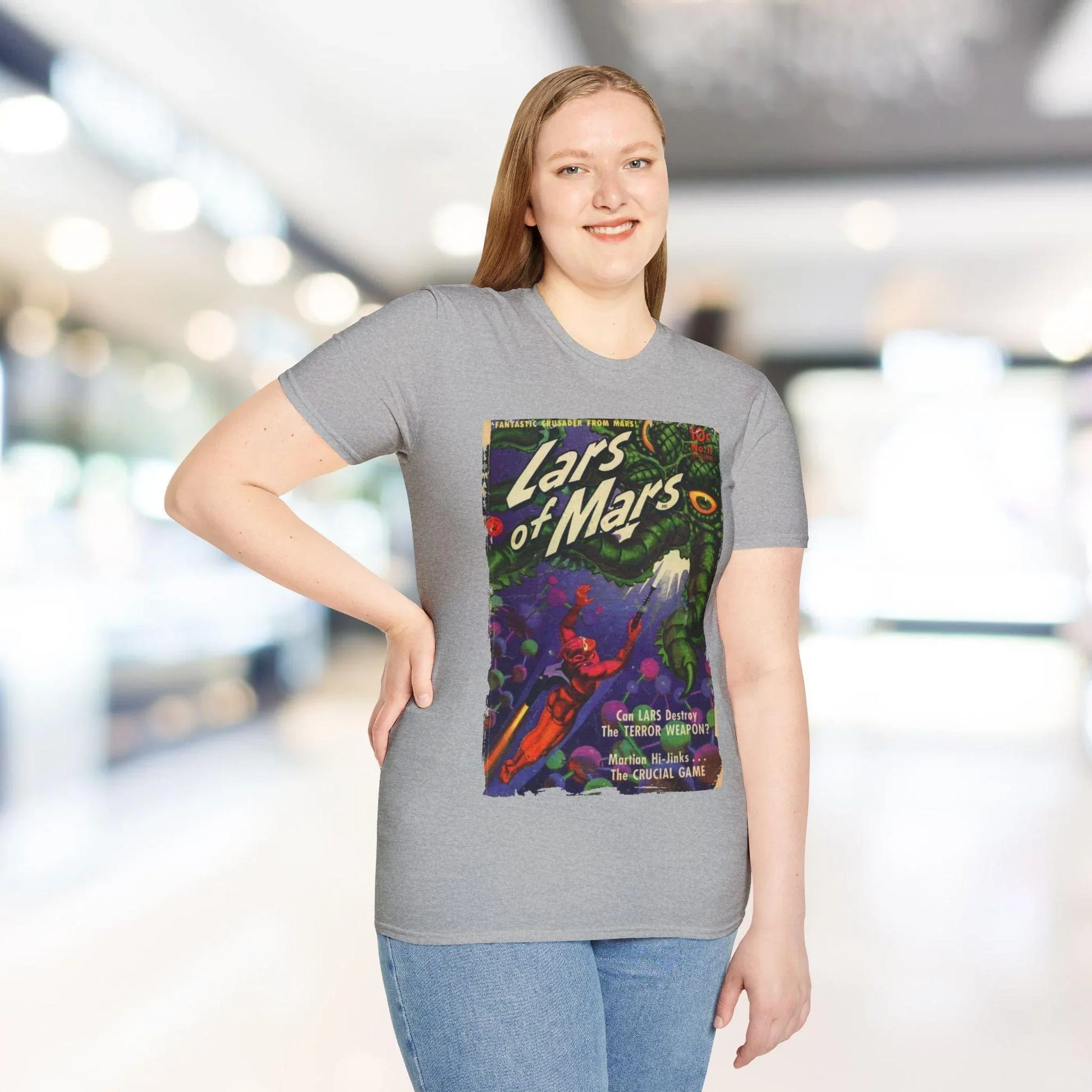 Close-up of the unisex softstyle fabric label on the chest showing the Lars of Mars 11 logo and fabric weave detail