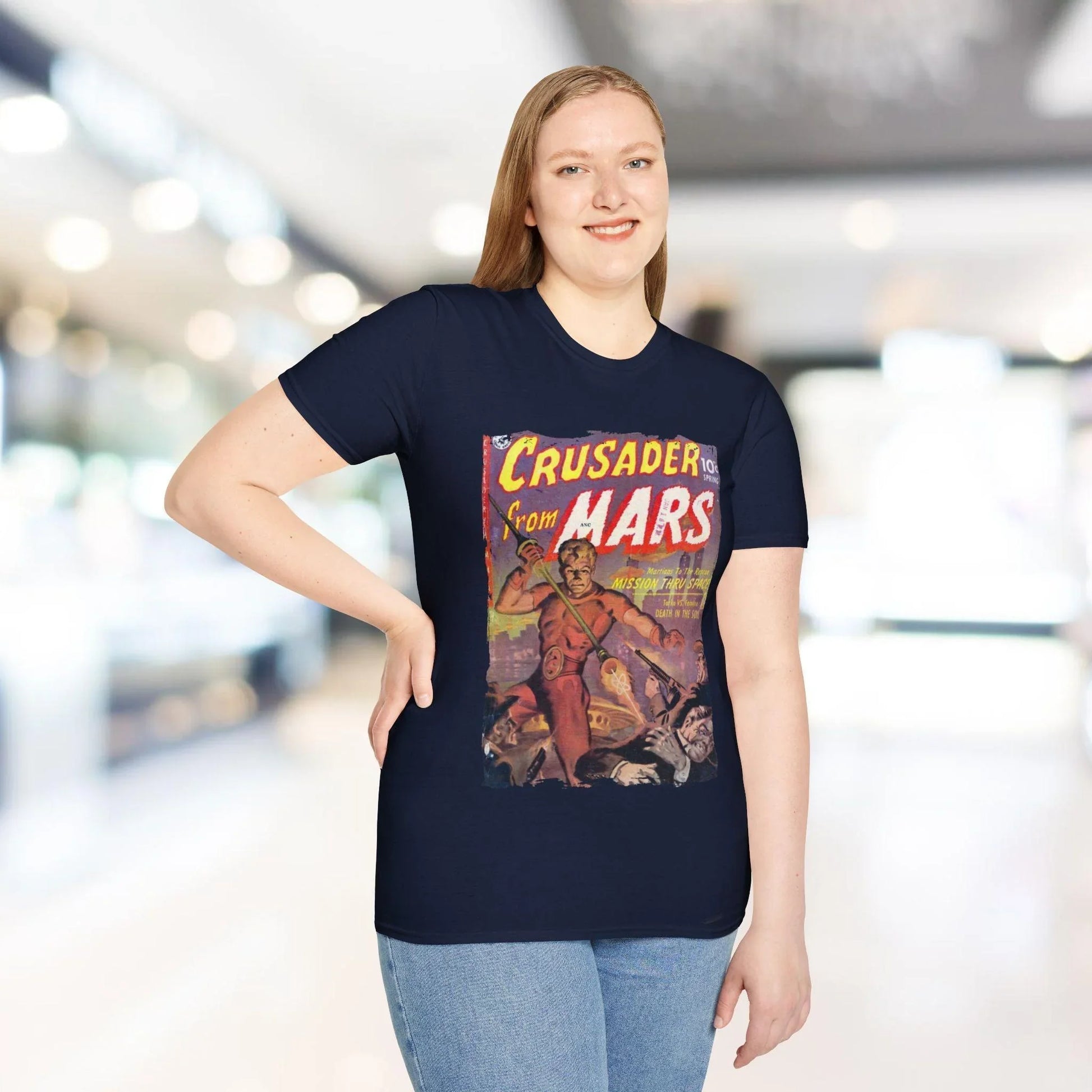 Close-up of the unisex softstyle fabric texture and subtle heather pattern in navy blue from a slight overhead angle