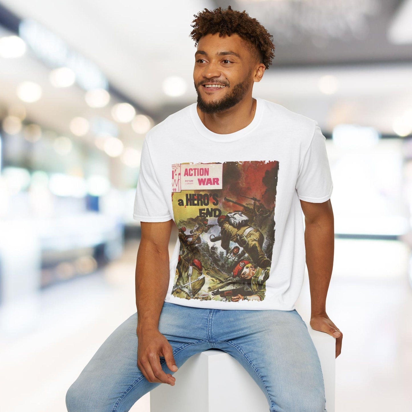 Close-up of the unisex softstyle T-shirt's lightweight, breathable cotton fabric in vibrant red, highlighting the subtle