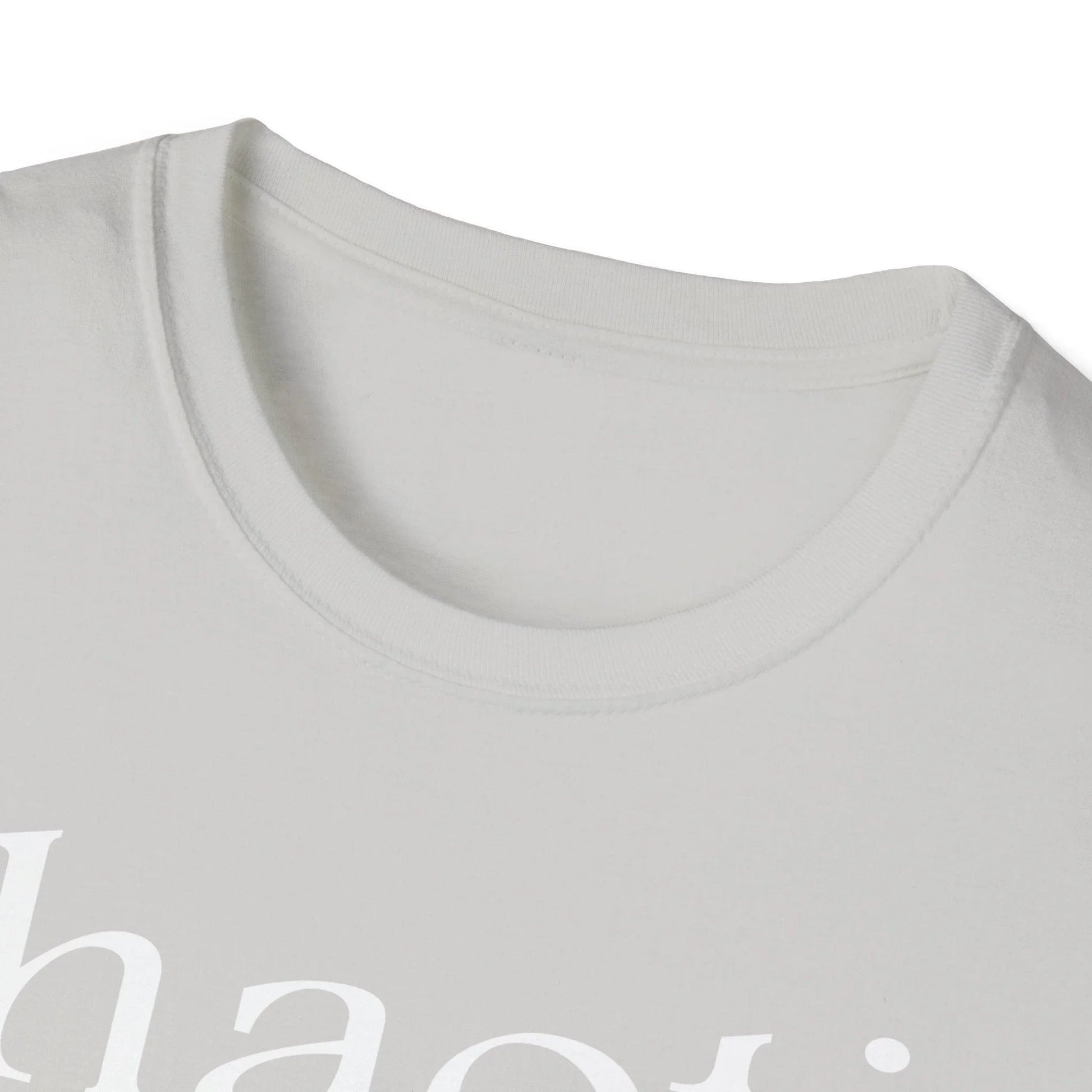 Close-up of the white, unisex relaxed-fit T-shirt fabric emphasizing soft cotton texture and subtle stitching detail at the