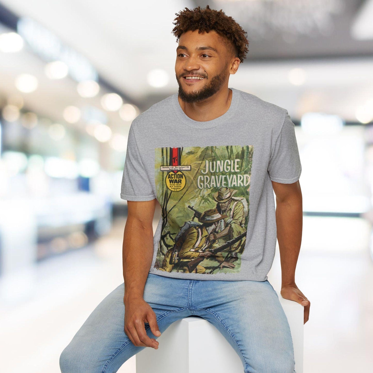 Close-up of the unisex fitted design displaying soft teal fabric and the subtle Action War #3 logo tag at the hem.