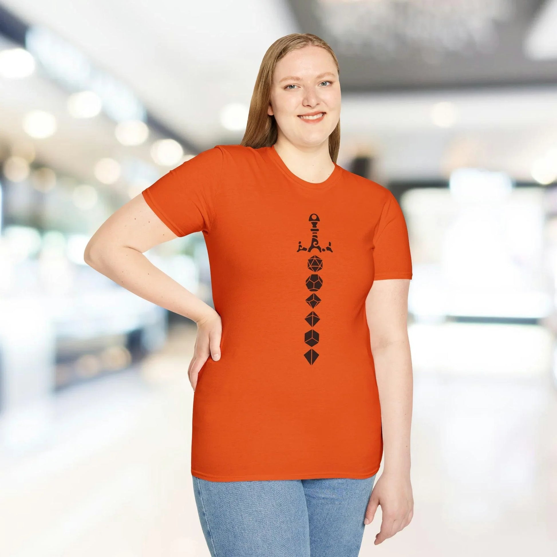 Close-up of the black fabric showing soft cotton texture and subtle stitching details around the neckline and sleeve hem.