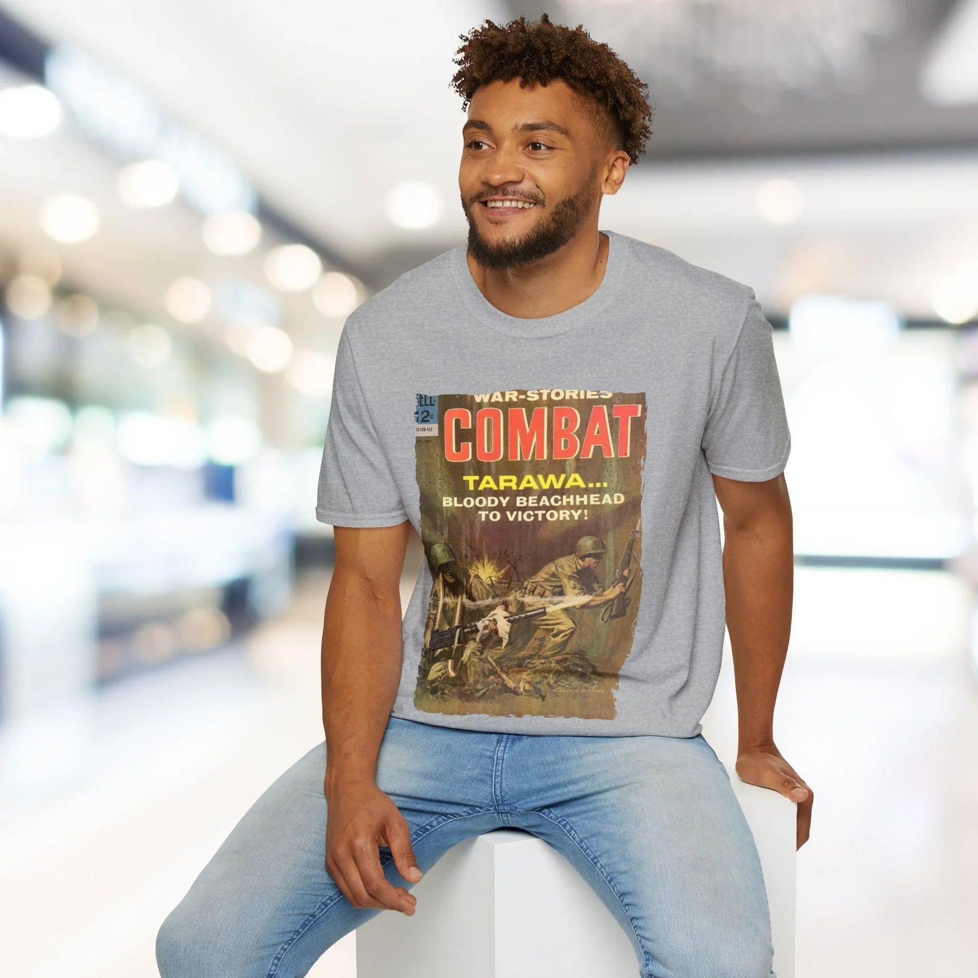 Close-up of the Combat Dec 1964 unisex softstyle T-shirt's relaxed fit, showing subtle fabric texture and heather navy color