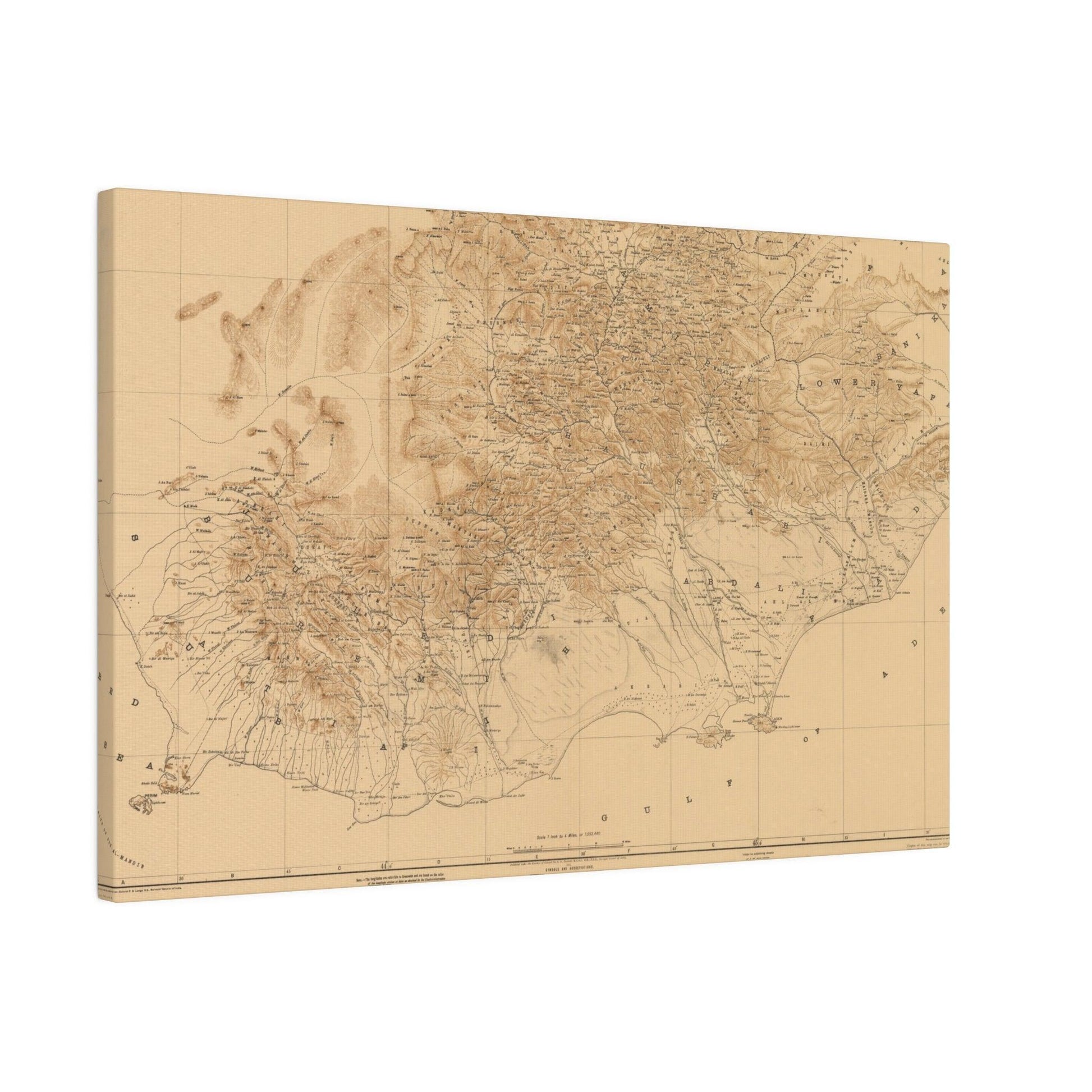 Close-up of textured canvas surface highlighting the detailed map engraving of Aden Protectorate, Arabian Peninsula 1914.