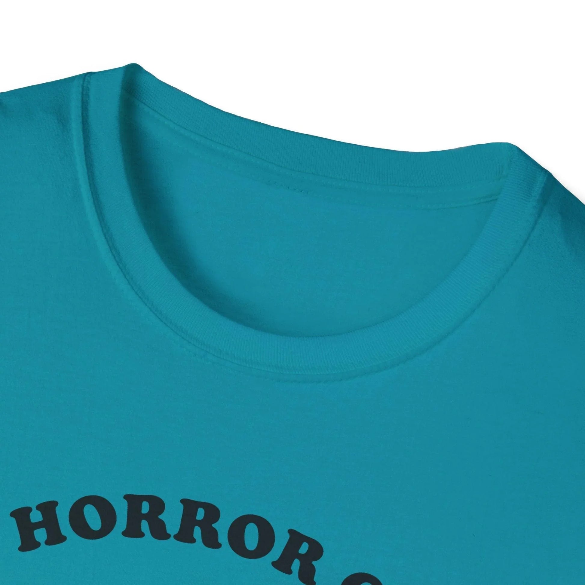 Detail shot of the Cosmic Horror Cuteness T-shirt’s soft cotton fabric, showing relaxed fit and deep navy color from a