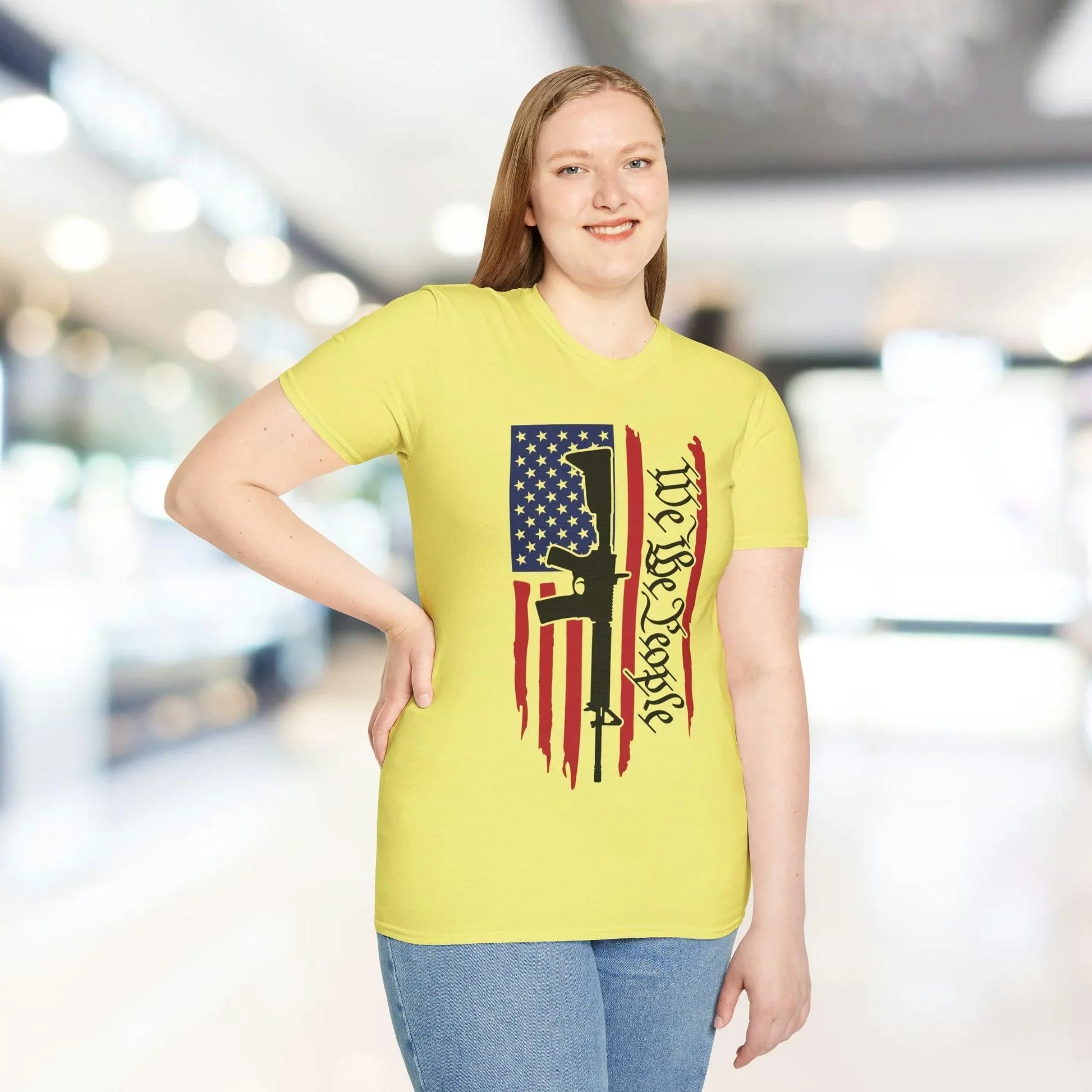 Close-up of the distressed vertical American flag graphic showcasing faded colors and textured print on soft cotton fabric.